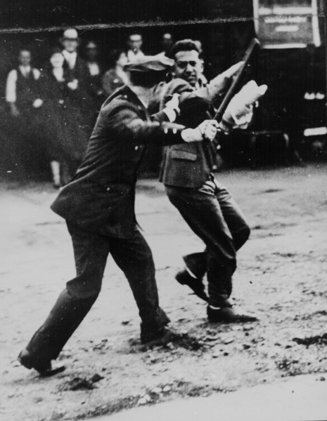 Communist protester and police